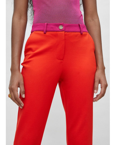 Pantalon orange avec détails